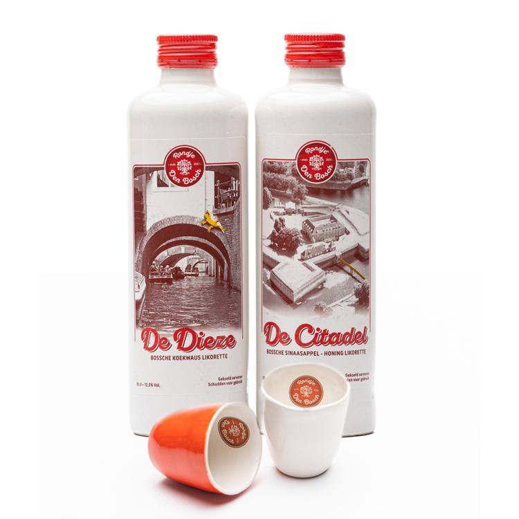 De likorette van Rondje Den Bosch is een laag alcoholhoudende likeur. 'Rondje Den Bosch' bestaat uit 6 verschillende smaken. Iedere smaak heeft een Den Bosch karakter gekoppeld aan bijvoorbeeld een gebouw, plek, gebeurtenis, geschiedenis etc. Zo proeft u de smaken & geschiedenis van Den Bosch. 'Knillis' brandewijn met suiker, 'De Citadel' honing/sinaasappel, 'De Dieze' koekwaus, 'Het Puthuis' karamel, 'De Moriaan' koffie & 'De Drakenfontein' chocolade.