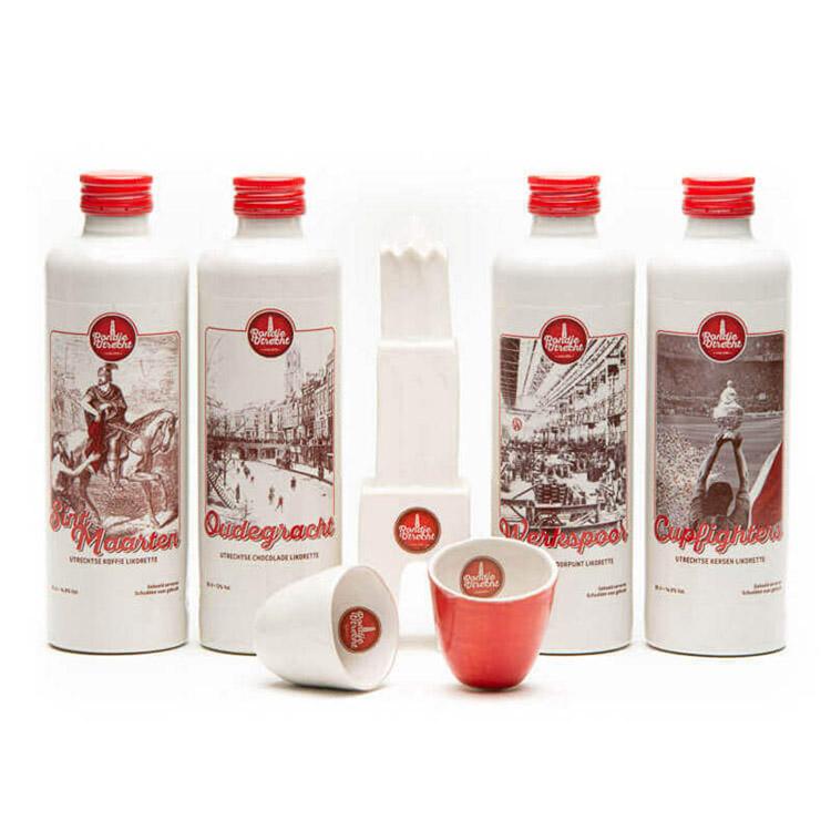 4 Flessen likorette cadeaupakket + 2 keramieken likeur glaasjes + keramieken Domtoren